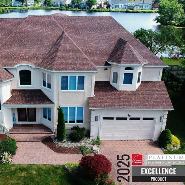 Completed Owens Corning Platinum roof installation on a luxury home in Voorhees, NJ by Warner Exteriors & Solar.